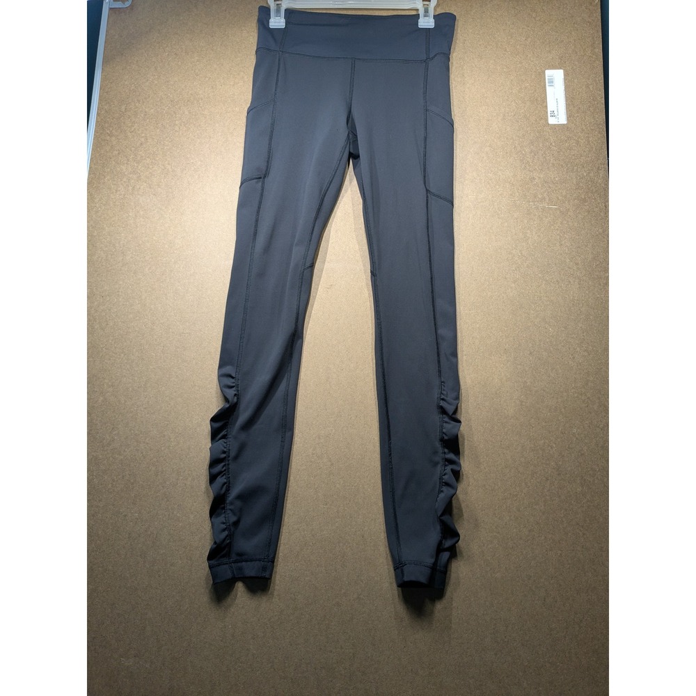 Lululemon Ruffle Hem Leggings Side Pockets Back Zip Gray Size 6